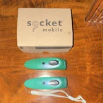 Socket Mobile S700 Usb Barcode Scanner With Charging Cable And Manual. Fixed Price $250.00.