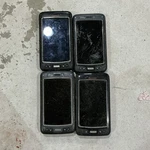 Lot Of (4) Honeywell Dolphin 70E Rf Handheld Terminal Black Barcode Scanner. Fixed Price $150.00.