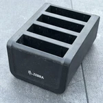 Zebra Slot Battery Charger Part Number: SAC-ET5X-4PPK1-01. Fixed Price $24.99.