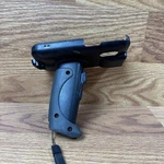 Verizon Infinite Peripherals CS-LP6-PG-VZW Black/gray Handheld Trigger Grip. Fixed Price $35.00.