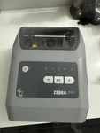 Zebra ZD621 Thermal Printer Includes Universal Power Cable And Stack Of Labels. Fixed Price $350.00.