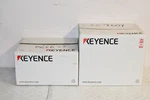 Keyence SR-5000W Bar Code Reader & OP-88495 Mounting Bracket #W6175. Fixed Price $4500.00.