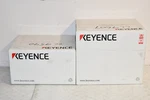 Keyence SR-5000W Bar Code Reader & OP-88495 Mounting Bracket #W6174. Fixed Price $4600.00.