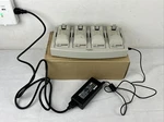 Alexander Technologies UBC3000 4-BAY Battery Charger New Box With Inserts. Fixed Price $13.49.