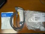 Symbol Barcode Scanner (LS2208-SR20001R-NA) With Cable Tahoe Stand. Fixed Price $25.00.