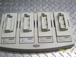 Symbol 20-33569-01 Battery Base W (4) 21-32665-09 Chargers Rev D. Fixed Price $16.50.
